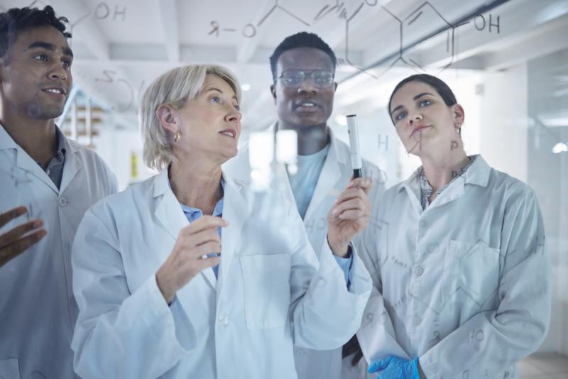 scientist holding a model