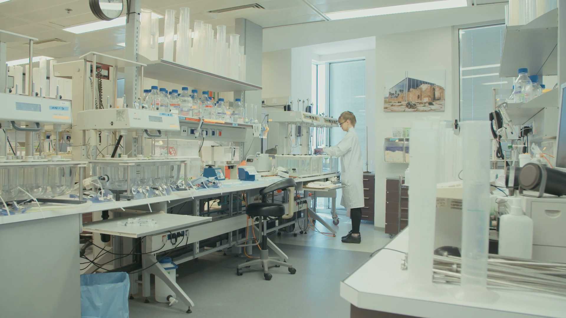 lab working in white coat in lab
