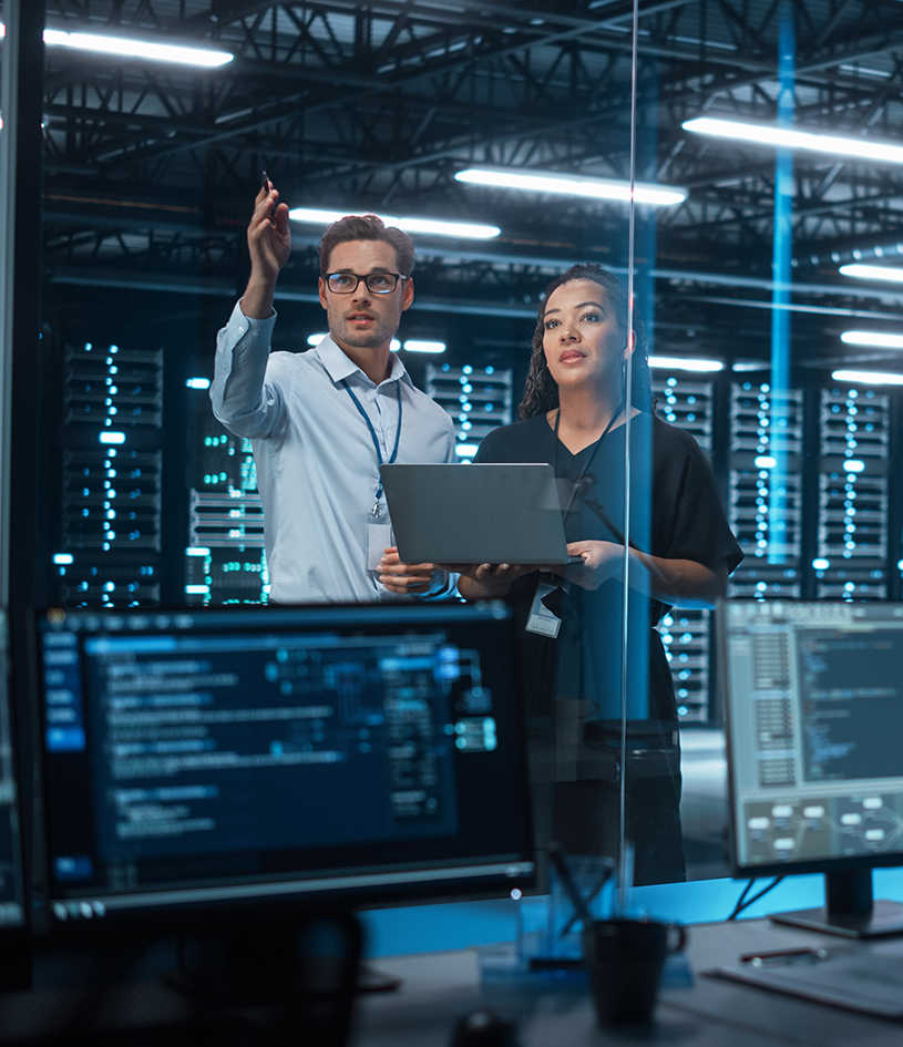 male and female inside of server room